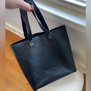 Plain black leather tote